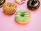 Donuts assorted with glazed on blue and pink