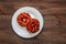 Donuts in black and orange glaze, a dish for Halloween