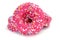 Donuts coated with a pink frosting and sprinkles of different co