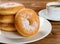 donuts with cup of coffee horizontal composition