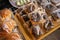 donuts with mesis wrapped in plastic on a serving plate on the table