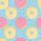 Donuts seamless pattern on blue background with white spotted. Desserts vector background in flat cartoons style.