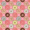 Donuts seamless pattern on pink background