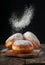 Donuts sprinkled with powdered sugar