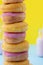 Donuts stacked with strawberry milk