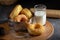 Donuts with sugar on a wooden plate over a dark table background