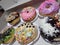 donuts of various flavors with beautiful decorations make your appetite increase