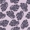 Doodle botanical seamless pattern with simple purple monstera foliage silhouettes