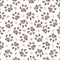 Doodle brown paw prints with pink hearts seamless vector pattern for fabric design