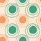 Doodle dots seamless pattern. Hand drawn decor textile cute ornament peach and green circles on pastel background. Abstact simple
