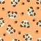 Doodle seamless pattern with tiger faces and paws. Perfect for T-shirt, textile and print. Hand drawn vector illustration