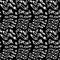 DOOM and GLOOM words warped, distorted, repeated, and arranged into seamless pattern background