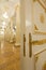 Door ajar perspective - luxury golden ballroom