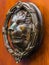 Door with brass knocker in the shape of a lion, beautiful entra