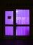 Door in the building with light from ultraviolet lamps of luminous violet light from the inside. Mysterious door in a building