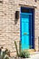 A door, colorfully painted, in the Tucson Arizona Barrio district