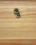 Door eye hole or peephole on wooden door