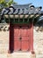 Door in fence of Changdeokgung Palace in Seoul