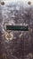 Door handle and keyhole on a rusty metal door. old steel surface. iron surface with doorknob. grunge texture. industrial