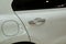 Door handle of a white car, soft focus. white automobile handle