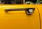 Door handle of a yellow automobile
