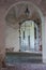 Door with Iron Bars and External Arches and Corridor of the Medieval Fortress of the Rossi in San Secondo, Parma - Italy