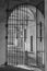 Door with Iron Bars and External Arches and Corridor of the Medieval Fortress of the Rossi in San Secondo, Parma - Italy