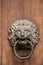 Door knob of an old historical building in shape of a lion made of iron