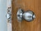 Door knobs that have been used for a long time.