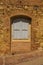 Door in Murlo in Tuscany, Italy
