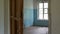 Door in old house is opening independently, nobody, old empty room, abandoned house, scary scene