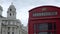 Door opens on red British phone box