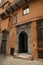 Door with ornaments in historic center of Genoa