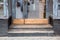 Door step at the entrance to an old restaurant with a wooden facade.