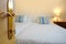 door to bright room open, Cozy Beds in Hotel, Serene Sleep Haven, Soft Hotel Pillows and Bedding, Rejuvenating Hotel Stay, Start