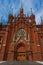 Door to the Gothic cathedral and the blue sky