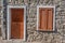 Door and window in a rustic wall