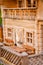 Door and Windows of a little miniature bird house designed like a apartment lodge in the alps