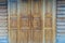 Door wooden pattern textured background, antique place in Thailand.