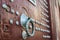 Doorknocker on brown wooden door, Morocco