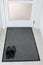 Doormat. A mat placed in a doorway. On which people can wipe their shoes on entering a home.