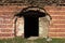 Doors in a very old red brick fortress