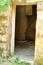 A doorway in an abandoned farmhouse