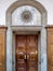 Doorway features ornate marble construction