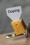 Doping sign on a cheese in mouse trap