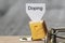 Doping sign on a cheese in mouse trap