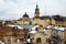 Dormition Church above the old houses in the center of Lviv, Ukraine in winter day.