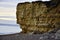 Dorset cliffs, sunset on the beach, sea and sky.