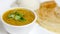 Dosa, idli with sambar and dal in white background for indian dinner or breakfast