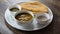 Dosa, Thin Pancake or crepe, is a South Indian meal served with sambhar and coconut chutney, Sauce